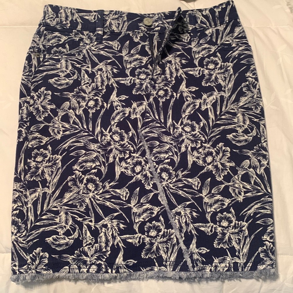 Denim-type skirt. Hits right above the knee. Worn once